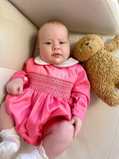 Pink smocked full sleeved romper