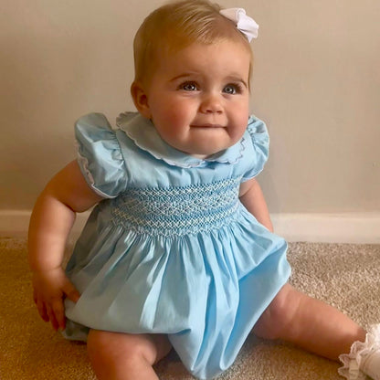Hand Smocked Talia romper soft blue