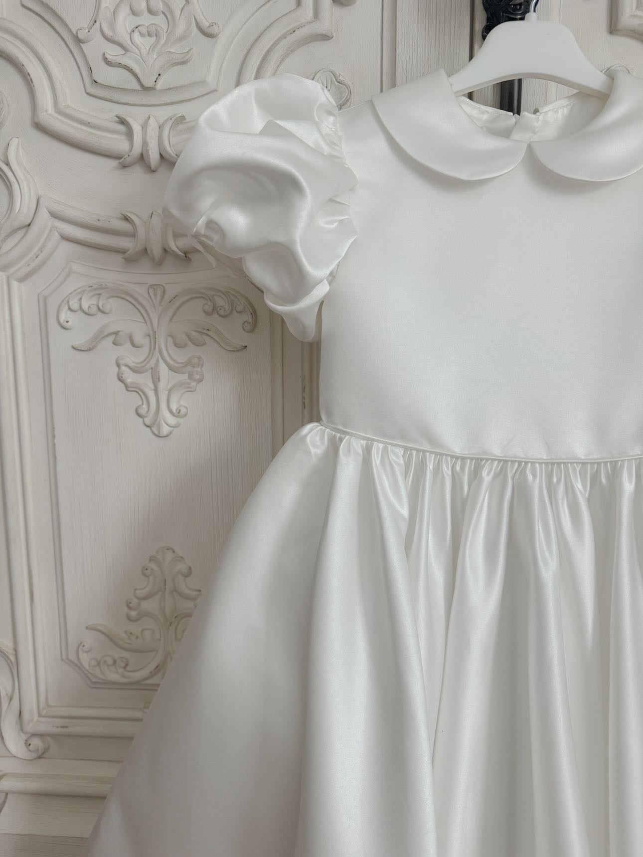 White satin puff sleeved occasion dress