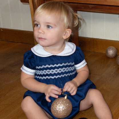 Navy Blue Hand Smocked REGAL Romper