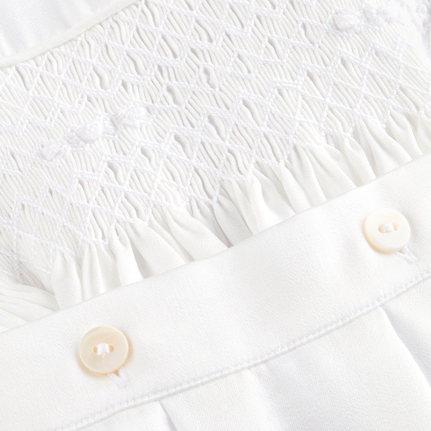 White satin hand smocked set