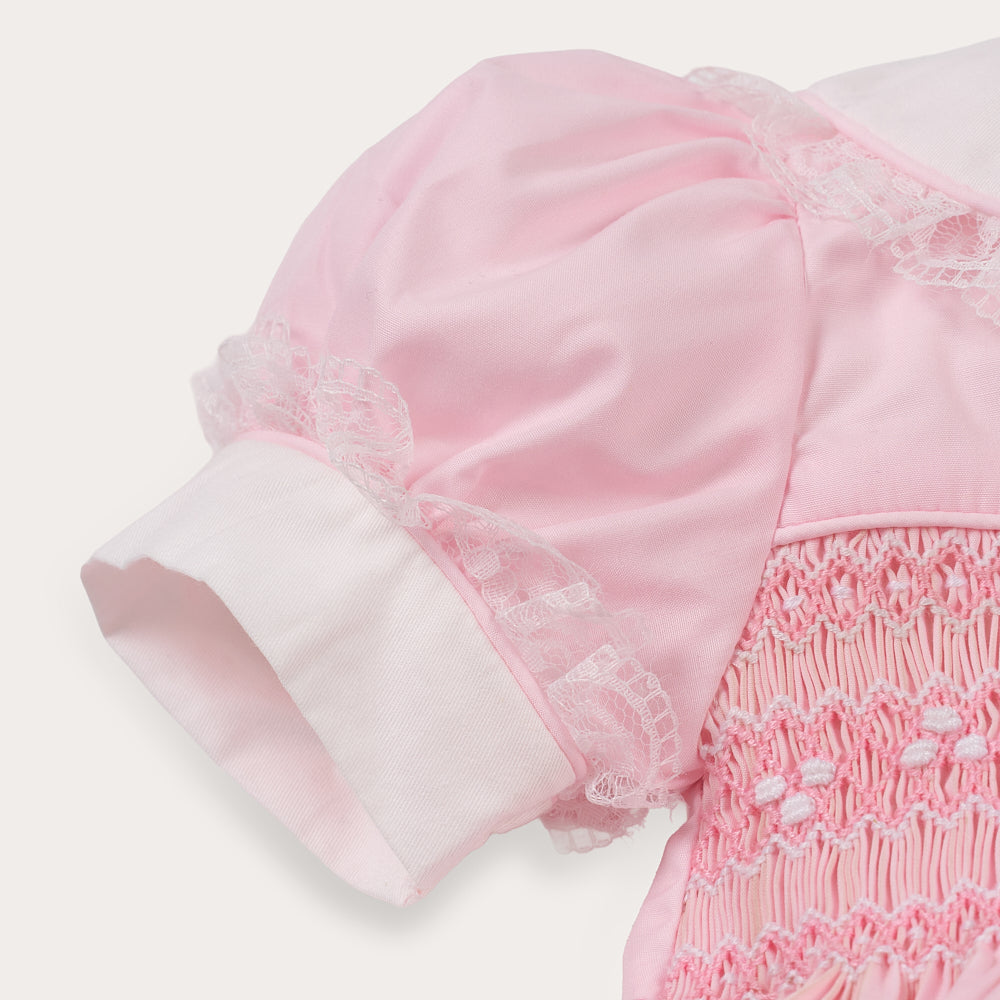 Hand Smocked Ellis romper soft pink