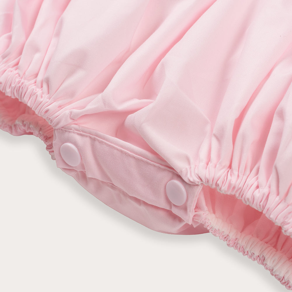 Hand Smocked Ellis romper soft pink
