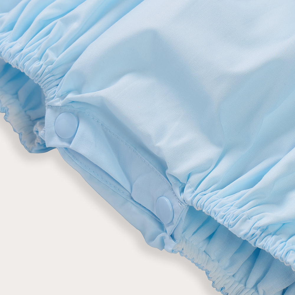 Hand Smocked Ellis romper soft blue
