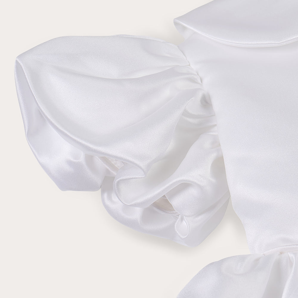 White satin puff sleeved occasion dress