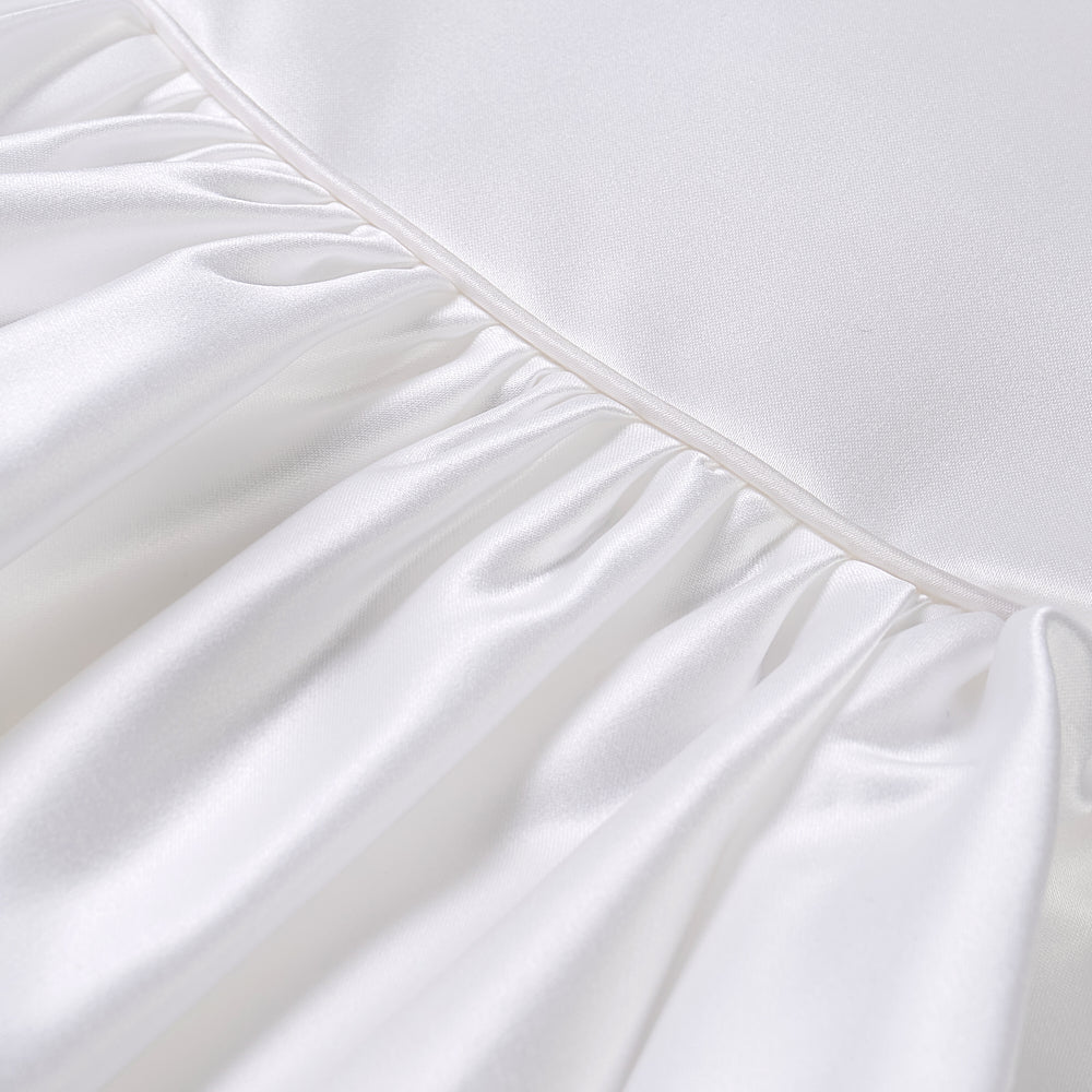 White satin puff sleeved occasion dress