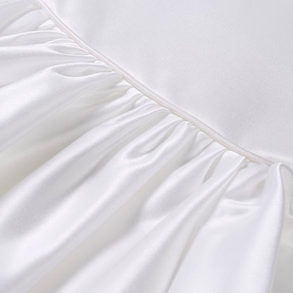 White satin puff sleeved occasion dress