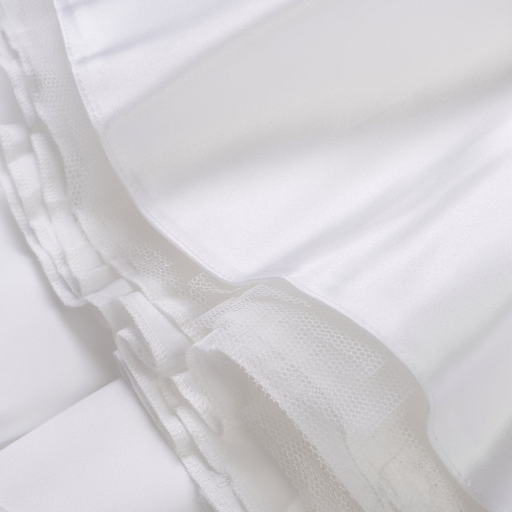 White satin puff sleeved occasion dress