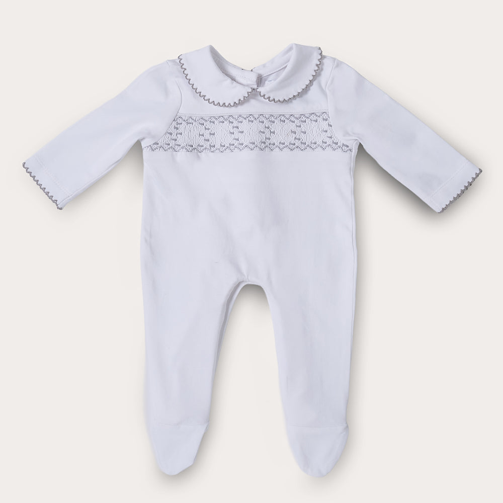 Hand smocked cotton babygrow with grey details