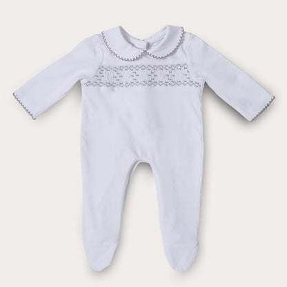 Hand smocked cotton babygrow with grey details