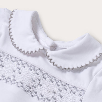 Hand smocked cotton babygrow with grey details