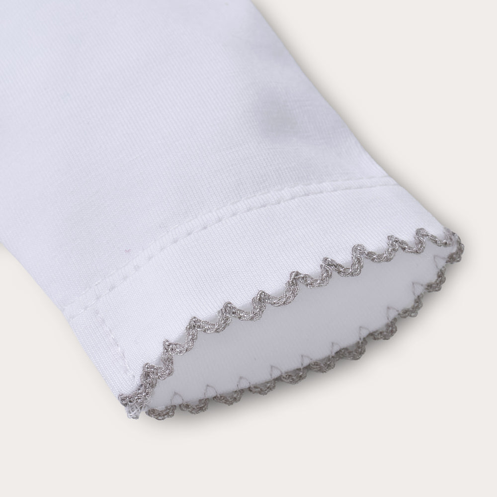 Hand smocked cotton babygrow with grey details