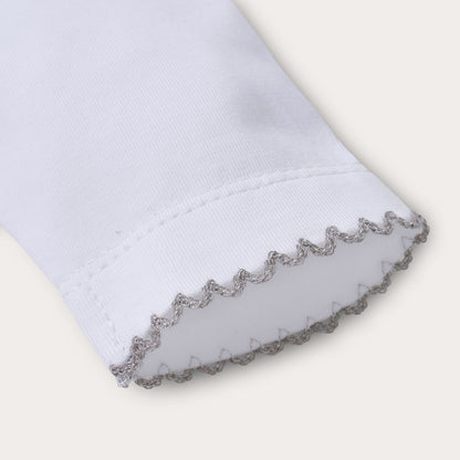 Hand smocked cotton babygrow with grey details