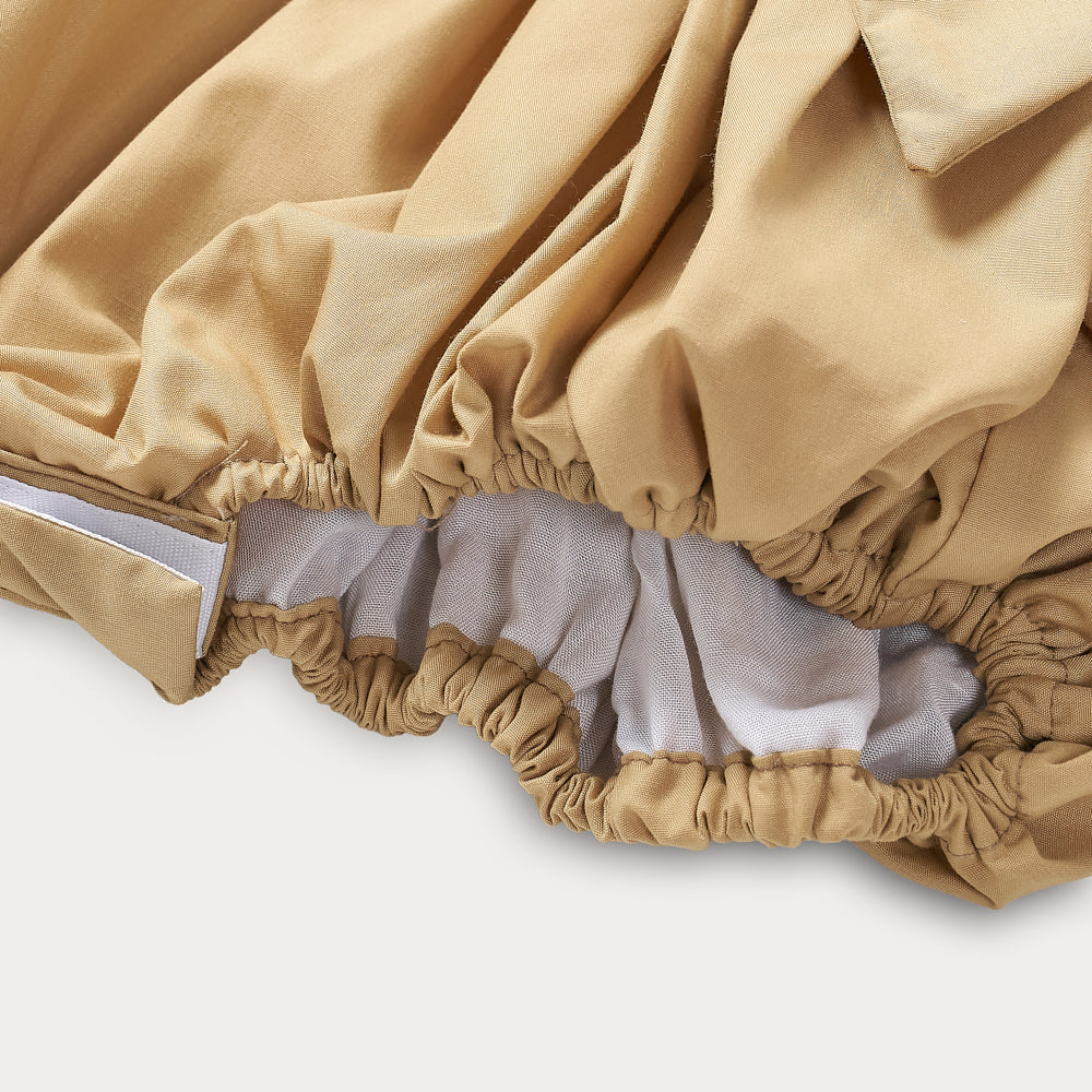 Hand Smocked Ellis romper in toffee