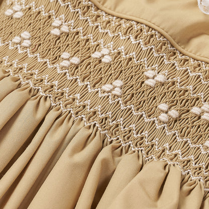 Hand Smocked Ellis romper in toffee