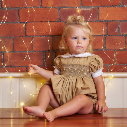 Hand Smocked Ellis romper in toffee