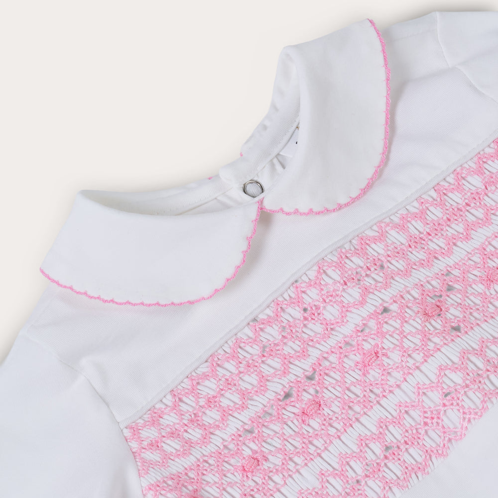 Hand Smocked White Baby Grow With Pink Hand Smocking