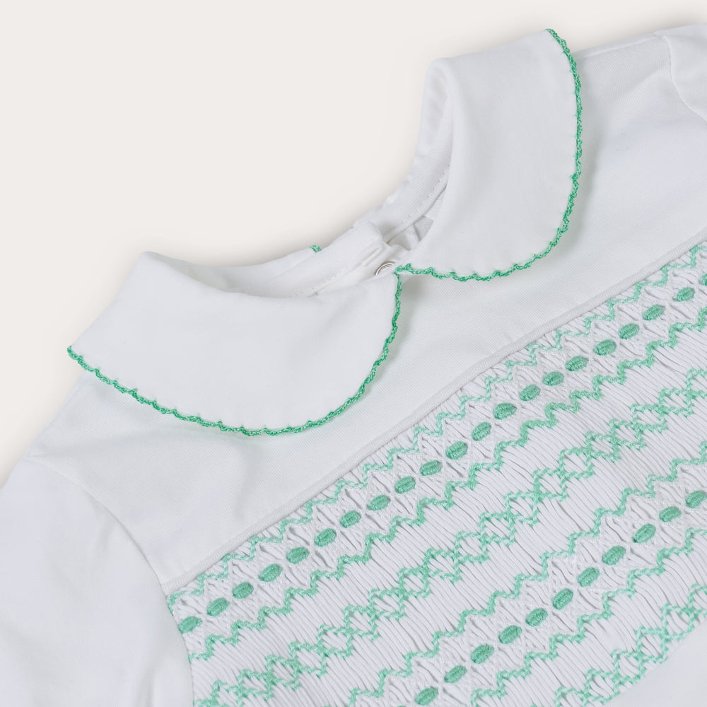 Hand Smocked White Baby Grow With Soft Green Hand Smocking