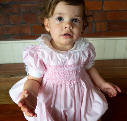 Hand Smocked Ellis romper soft pink