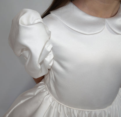 White satin puff sleeved occasion dress