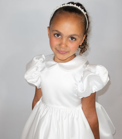 White satin puff sleeved occasion dress