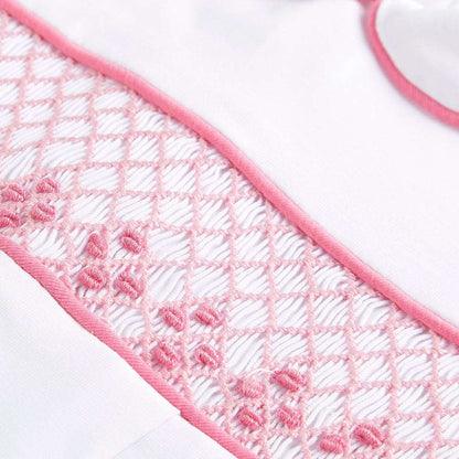 Hand smocked cotton babygrow pink