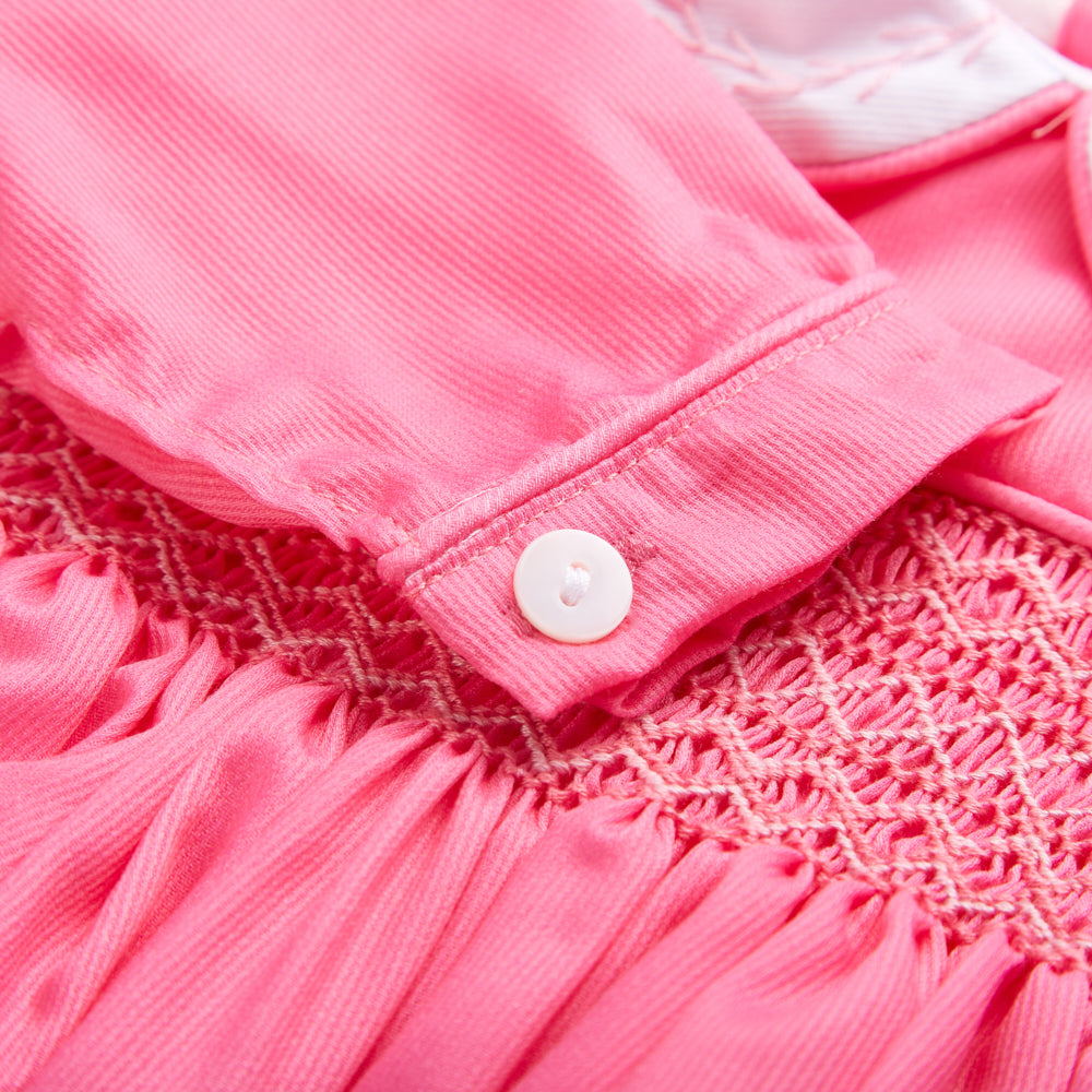 Pink smocked full sleeved romper